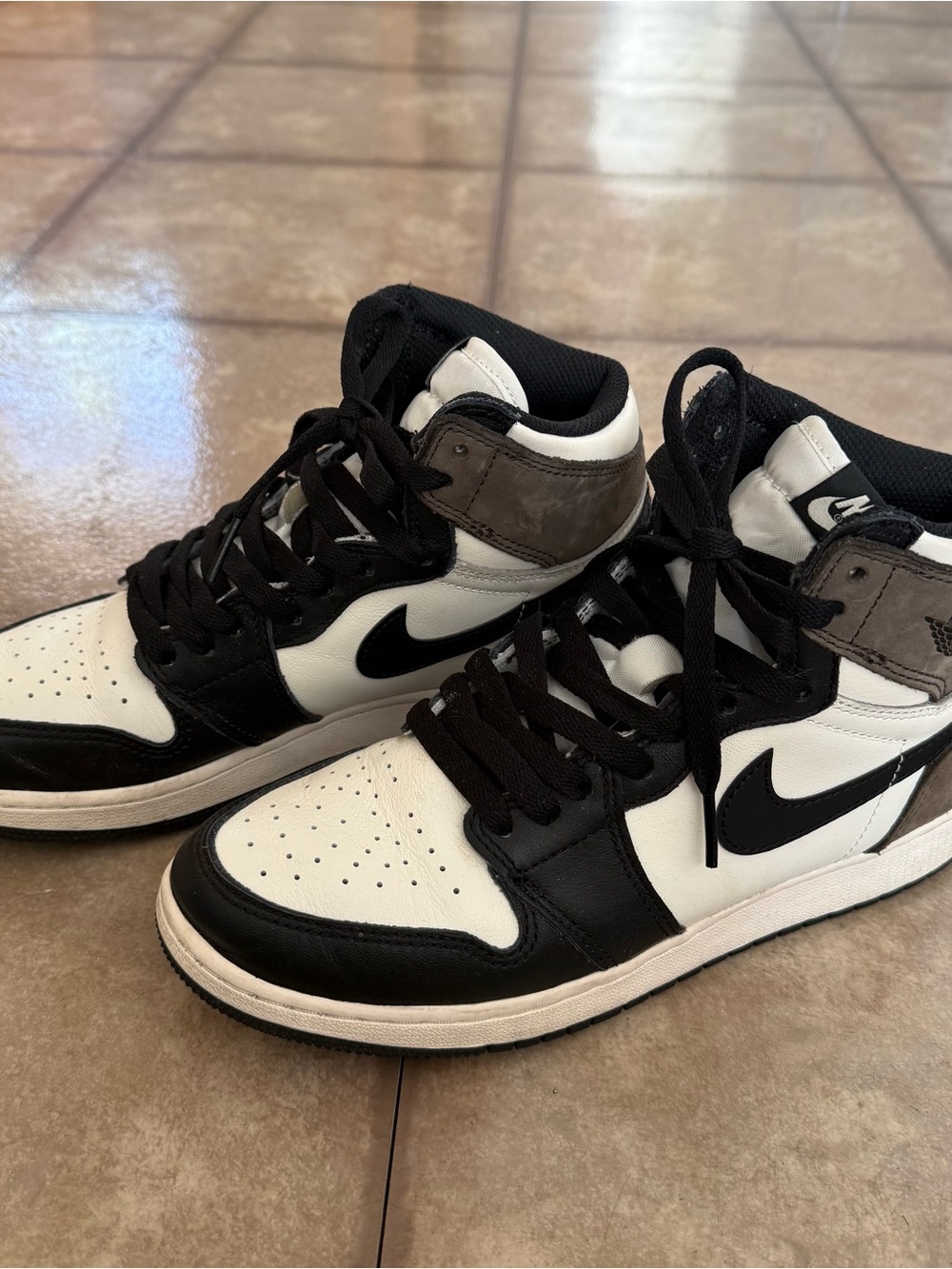Nike Black and White High-Top Sneakers with Dark Brown Accents